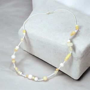 Elegant White and Yellow Beaded Necklace
